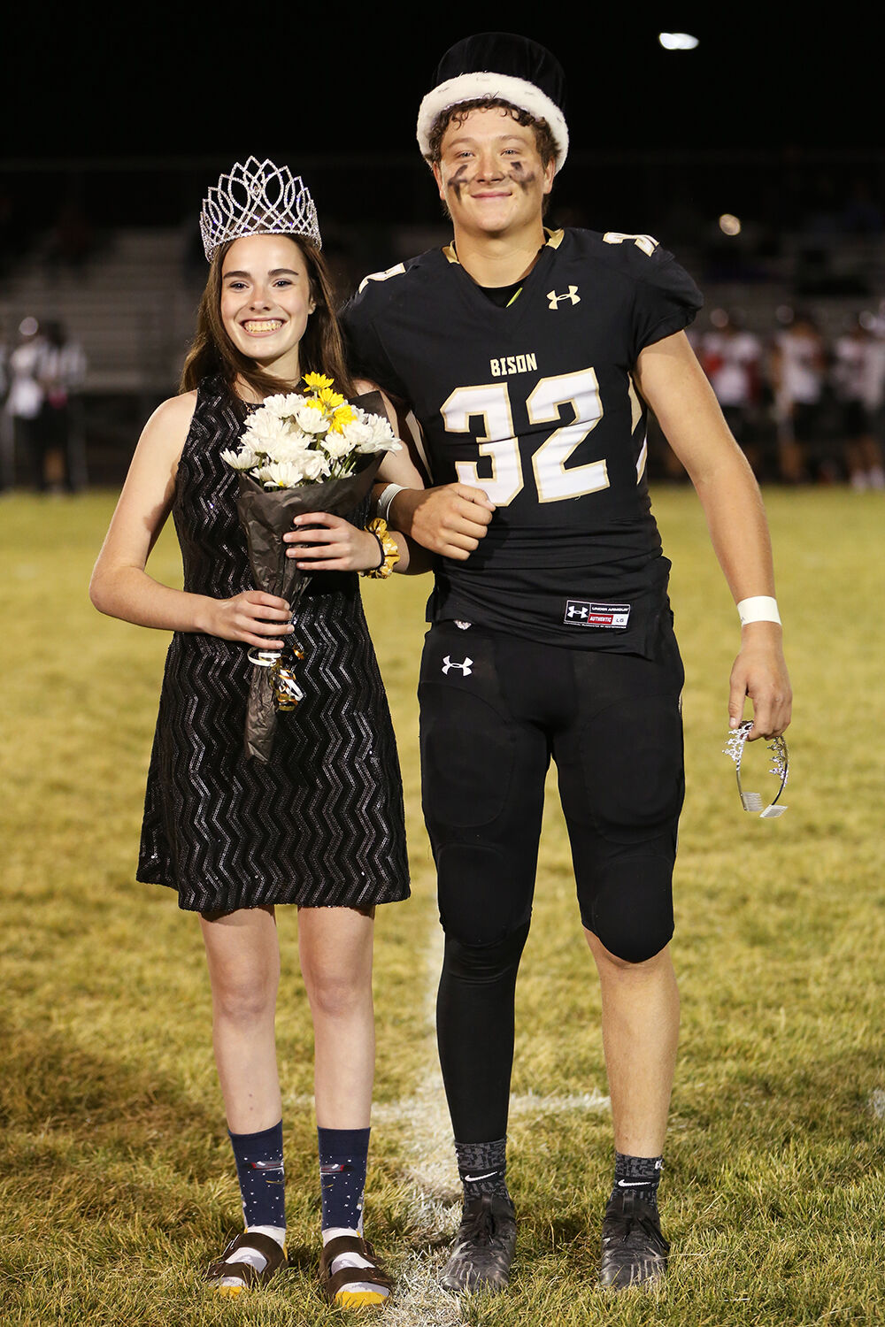 Queen Hollis Mantle andkng Calvin Rule balance their newly placed crowns